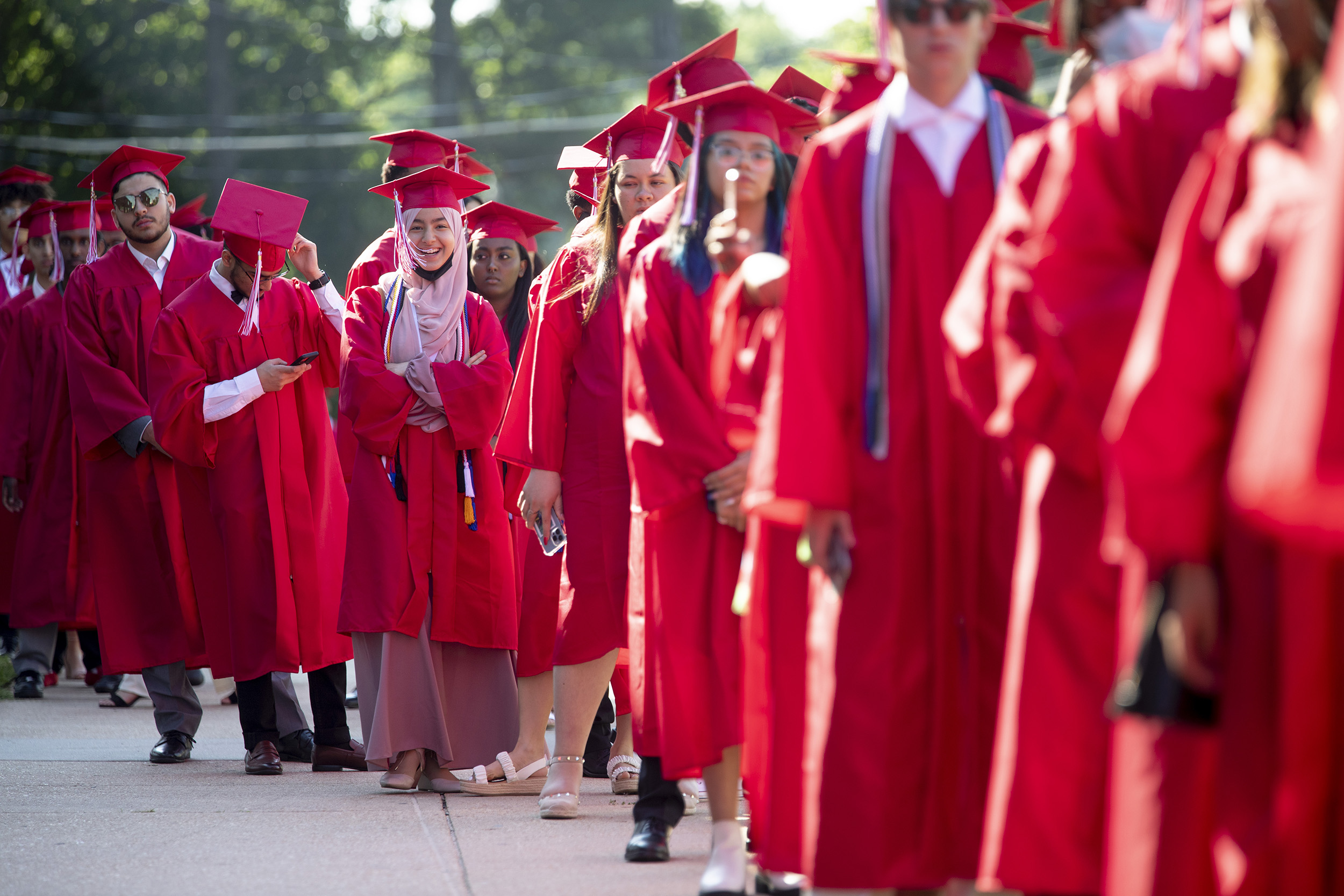 Photo of a line of Annadale High School graduates.